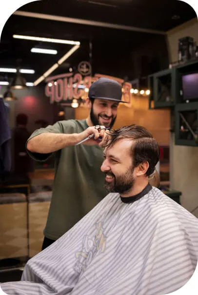 salon barber cutting customer hair